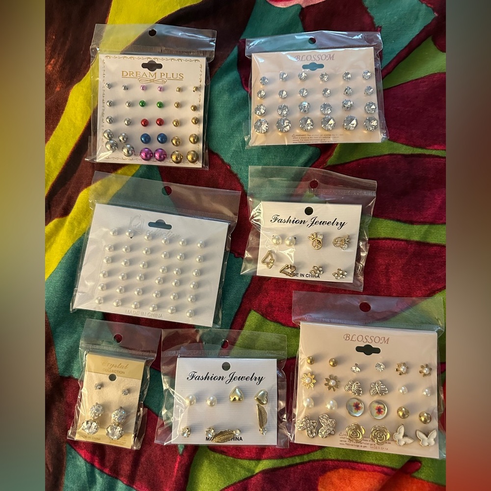 Large group of tiny stud earrings